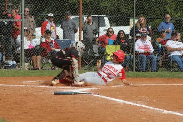 Comanche catcher Mykayla Slovak tags out a Washington base runner in the regional championship game on Friday.