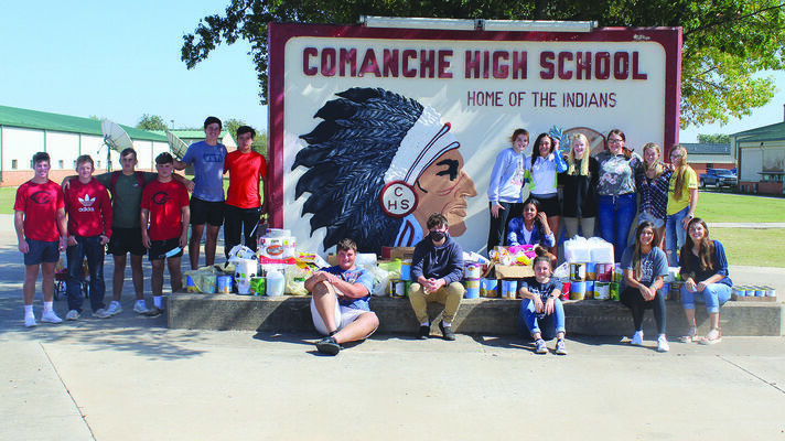 Some members of the Comanche Student Council and National Honor Society display the items they collected for hurricane relief effort
